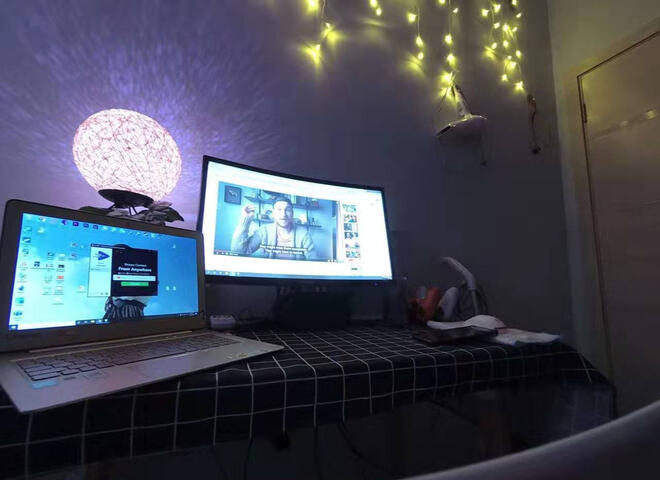 photo of the laptop and monitor, and lamp